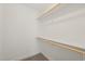 A walk-in closet provides ample storage with rods and a shelf at 60 Consella Way, Franklinton, NC 27525