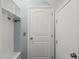 Functional mudroom featuring built-in storage, hooks, and a door to the exterior at 60 Consella Way, Franklinton, NC 27525