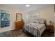 Comfortable bedroom features a spacious closet, dresser and plenty of natural light at 600 Longleaf Dr, Chapel Hill, NC 27517