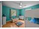 ' bedroom features a playful decor, ample space, and plenty of natural light at 600 Longleaf Dr, Chapel Hill, NC 27517