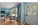 Inviting living room with hardwood floors, large windows, and comfortable seating, creating a cozy atmosphere at 600 Longleaf Dr, Chapel Hill, NC 27517