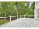 Spacious back deck overlooking private wooded backyard, perfect for outdoor entertaining at 7000 Millstone Ridge Ct, Raleigh, NC 27614