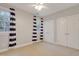 Bedroom featuring neutral paint, carpet, ceiling fan, and two windows at 7000 Millstone Ridge Ct, Raleigh, NC 27614