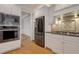 Kitchen featuring stainless steel appliances, white cabinets, a gas range and hardwood floors at 7000 Millstone Ridge Ct, Raleigh, NC 27614