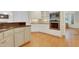 Bright kitchen with granite countertops, stainless steel appliances, and custom cabinetry at 7000 Millstone Ridge Ct, Raleigh, NC 27614