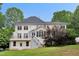 Spacious home features a walkout basement, large deck, and a landscaped yard at 7000 Millstone Ridge Ct, Raleigh, NC 27614