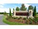 Welcome to Prestleigh! Beautifully landscaped community sign surrounded by lush greenery at 701 Holstein Dairy Way, Wake Forest, NC 27587