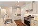 Gourmet kitchen with granite countertops, stainless steel appliances, and ample cabinet space at 704 Long Lake Dr, Fuquay Varina, NC 27526