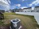 Large, fenced backyard with a well-maintained lawn, perfect for outdoor activities and privacy at 712 Emmer St, Rolesville, NC 27571
