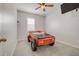 The bedroom features a playful car-shaped bed, ceiling fan, and ample space for a  at 712 Emmer St, Rolesville, NC 27571