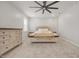 Large bedroom with a neutral color palette, ceiling fan, and ample natural light at 712 Emmer St, Rolesville, NC 27571