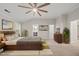 Spacious main bedroom with large bed, neutral carpet, ensuite bathroom, and walk-in closet at 7340 Doverton Ct, Raleigh, NC 27615
