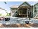 Backyard features a covered deck and patio, perfect for entertainment at 7660 Channery Way, Raleigh, NC 27616