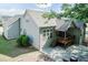 Aerial view showcasing a backyard with deck, patio, and lush greenery offers outdoor relaxation at 7660 Channery Way, Raleigh, NC 27616
