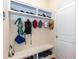 Organized mudroom with built-in shelving, bench, hooks, and space for shoes and accessories at 7660 Channery Way, Raleigh, NC 27616