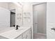 Bathroom with a modern vanity, faucet, and mirror at 7761 Winners Edge St, Raleigh, NC 27617
