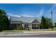 Charming exterior of community building features brick accents, professional landscaping, and ample parking at 7761 Winners Edge St, Raleigh, NC 27617