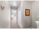 Hallway leading to a bedroom with neutral colors and a closet at 7761 Winners Edge St, Raleigh, NC 27617