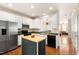 Spacious kitchen featuring stainless appliances, island, and an open floor plan at 7761 Winners Edge St, Raleigh, NC 27617