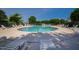 Relax by the community pool with lounge chairs and convenient access in a serene setting at 7761 Winners Edge St, Raleigh, NC 27617