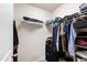 Walk-in closet featuring a wire shelving system and clothing at 7761 Winners Edge St, Raleigh, NC 27617
