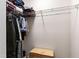 Walk-in closet featuring a wire shelving system with hanging clothing at 7761 Winners Edge St, Raleigh, NC 27617