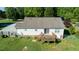 Aerial view of a house with a wooden deck and a spacious fenced backyard at 78 Cross Creek Ct, Timberlake, NC 27583