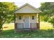 Versatile outbuilding on a grassy lot, offering flexible space for hobbies or storage at 78 Cross Creek Ct, Timberlake, NC 27583