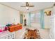 Bedroom with hardwood-styled paneled walls with colorful modern decor at 80 Lewis Moody Rd, Bear Creek, NC 27207
