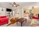 Open living space with views into the kitchen and dining area, showcasing a comfortable seating arrangement at 80 Lewis Moody Rd, Bear Creek, NC 27207
