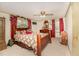 Cozy main bedroom features wood furniture, and a large ceiling fan for additional comfort at 80 Lewis Moody Rd, Bear Creek, NC 27207