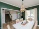 Dining room featuring chandelier, window, and a view of the entryway at 808 Trinity Park Dr, Wake Forest, NC 27587