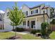 Beautiful two-story home boasting a lovely front porch, complemented by meticulous landscaping and curb appeal at 808 Trinity Park Dr, Wake Forest, NC 27587