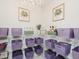 Spacious pantry with organized shelving, baskets and a chandelier at 808 Trinity Park Dr, Wake Forest, NC 27587