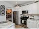 Organized pantry with ample shelving and storage baskets, offering practical space for kitchen essentials at 808 Trinity Park Dr, Wake Forest, NC 27587