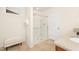Bathroom featuring a glass-doored shower, a granite countertop vanity, and a white stool for sitting at 844 Cozy Oak Ave, Cary, NC 27519