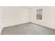 A clean, empty bedroom with plush carpeting and lots of natural light at 844 Cozy Oak Ave, Cary, NC 27519