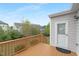 View from wooden deck featuring a door and the beautiful neighborhood at 844 Cozy Oak Ave, Cary, NC 27519