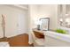 Charming foyer with a small desk, chair, and a view of the staircase at 844 Cozy Oak Ave, Cary, NC 27519