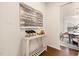 Hallway with a console table, decor, and view to the dining area at 844 Cozy Oak Ave, Cary, NC 27519