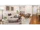 Inviting living room with hardwood floors, stylish furniture, and lots of natural light at 844 Cozy Oak Ave, Cary, NC 27519