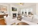 Bright and inviting living room with a fireplace, hardwood floors, and neutral decor at 844 Cozy Oak Ave, Cary, NC 27519