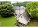 Overhead view of a home with a large backyard, detached garage, and beautiful landscaping at 8517 Falkirk Ridge Ct, Wake Forest, NC 27587