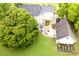 Private backyard showing an outdoor seating area, patio, and a beautifully landscaped garden at 8517 Falkirk Ridge Ct, Wake Forest, NC 27587
