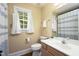 Well-lit bathroom with a vanity and a shower/tub combo at 8517 Falkirk Ridge Ct, Wake Forest, NC 27587