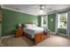 Spacious bedroom with natural light, a ceiling fan and plush carpeting at 8517 Falkirk Ridge Ct, Wake Forest, NC 27587