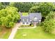 Stunning two-story home with a lush lawn and landscaped front yard at 8517 Falkirk Ridge Ct, Wake Forest, NC 27587