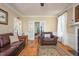 View of a comfortable living room with hardwood floors and a fireplace at 8517 Falkirk Ridge Ct, Wake Forest, NC 27587