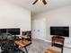 Home office with computer setup, television, and natural lighting at 90 Heathgreen Dr, Clayton, NC 27527