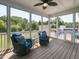 Relaxing screened porch with wicker furniture and outdoor views at 90 Heathgreen Dr, Clayton, NC 27527